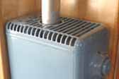 Photo of vintage Duo-Therm gas heater in 1948 Westcraft Sequoia Trailer